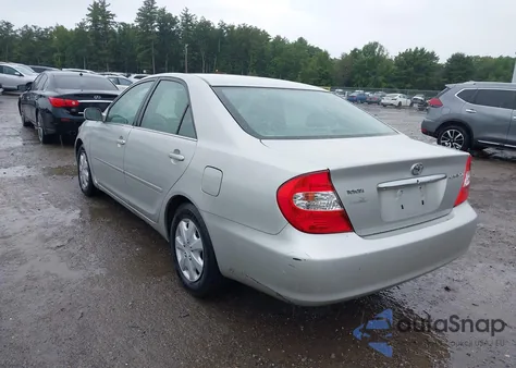 2002 Toyota Camry Xle z USA, uszkodzony, nr VIN 4T1BE30K92U612119